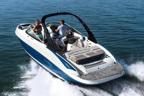 Slide: The Image of Manufacturer Provided Image: 2018 Rinker QX26 BR boat cruising on water with two people onboard. - 27