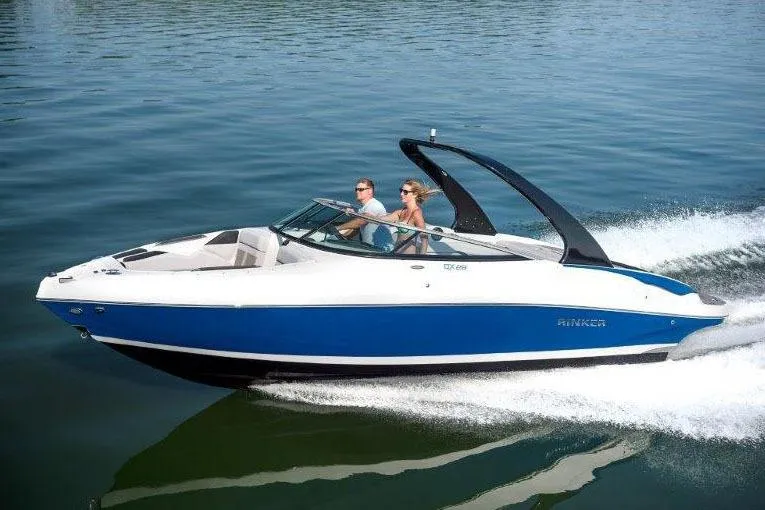 Slide: The Image of Manufacturer Provided Image: 2018 Rinker QX26 BR speedboat cruising on a lake. - 28