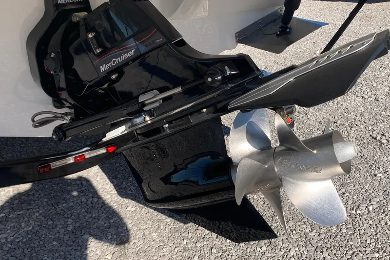 Slide: The Image of 2018 Rinker QX26 BR boat with MerCruiser Bravo Three outdrive and propeller. - 5