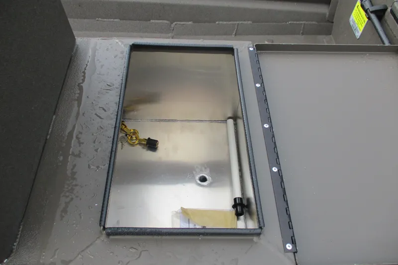 Slide: The Image of Open storage compartment in 2025 Alweld 1756 CC VV Marsh Jon boat. - 15