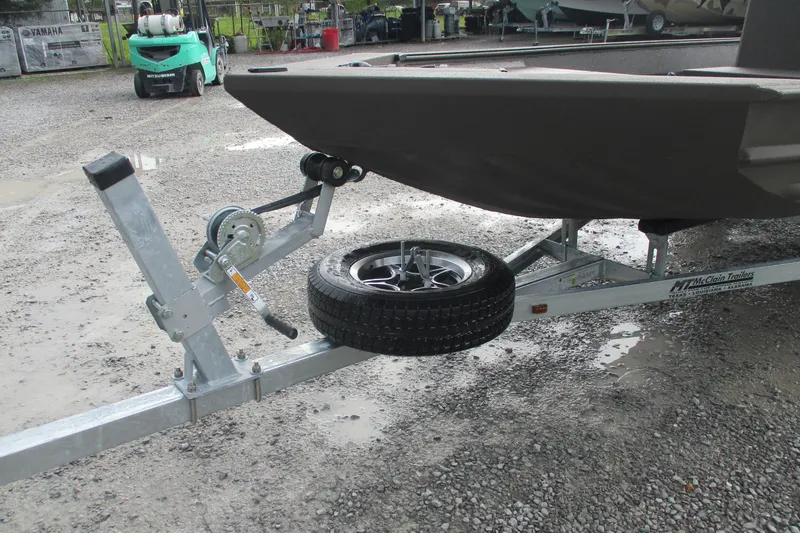 Slide: The Image of 2025 Alweld 1756 CC VV Marsh Jon boat on trailer with spare tire. - 6