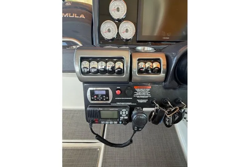 Slide: The Image of Control panel of a 2018 Formula 350 Crossover Bowrider OB boat. - 19