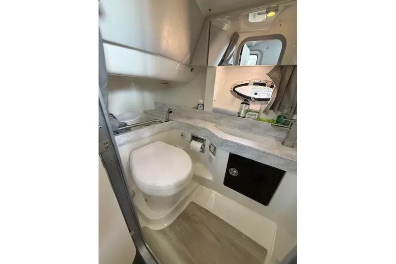 Slide: The Image of 2018 Formula 350 Crossover Bowrider OB bathroom with modern amenities and sleek design. - 35