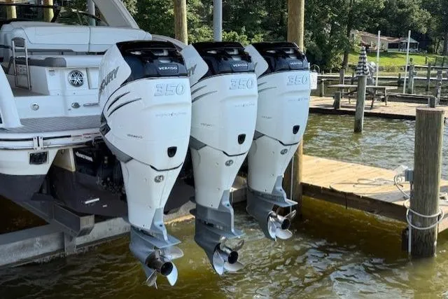 Slide: The Image of 2018 Formula 350 Crossover Bowrider OB with triple Mercury Verado outboard engines docked. - 36