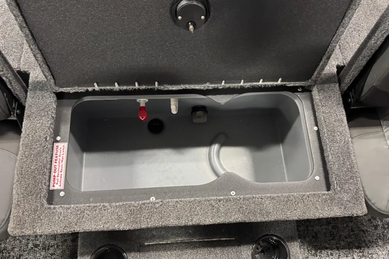 Slide: The Image of 2026 Tracker Targa V-18 Combo boat storage compartment with pump-out feature. - 11