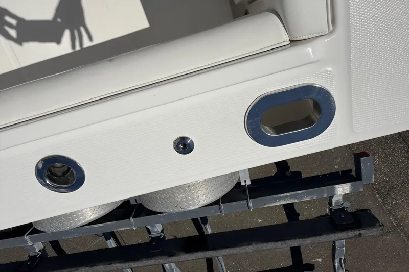 Slide: The Image of 2026 Regulator 25 boat detail showing fittings and textured surface. - 54