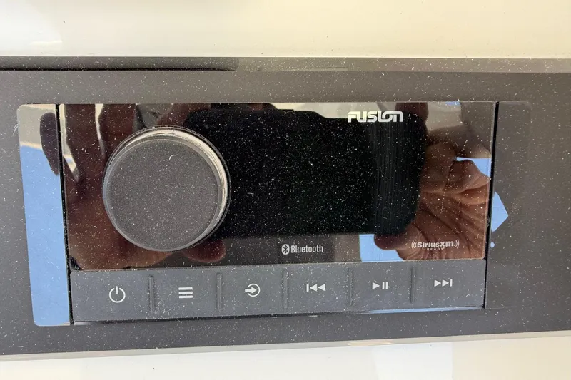 Slide: The Image of Fusion audio system with Bluetooth and SiriusXM, Regulator 25, 2026 model. - 58