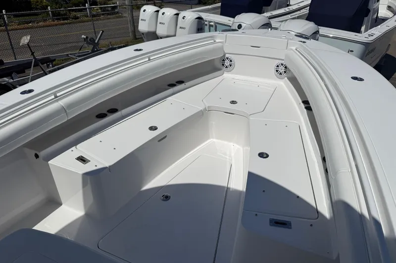Slide: The Image of 2026 Regulator 25 boat interior with spacious seating and storage compartments. - 67
