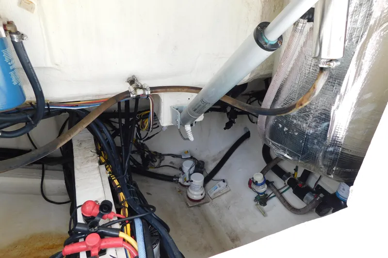 Slide: The Image of 2021 Cobia 262 Center Console boat interior wiring and plumbing details. - 20