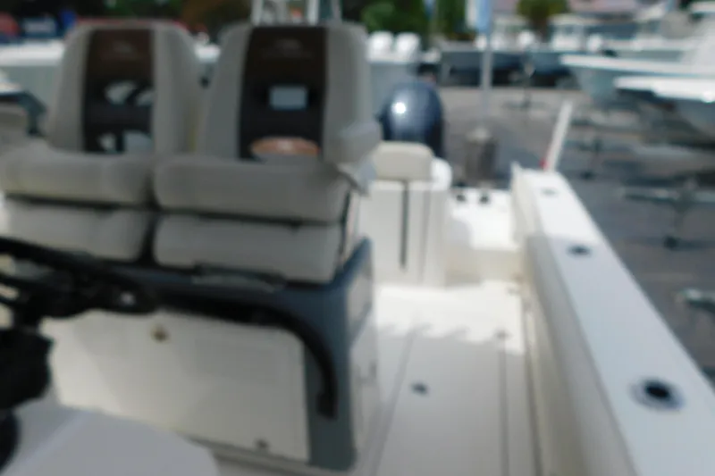 Slide: The Image of Blurry interior view of a 2021 Cobia 262 Center Console boat. - 40