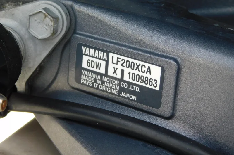 Slide: The Image of Yamaha LF200XCA engine label on 2021 Cobia 262 Center Console boat. - 48