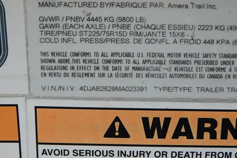 Slide: The Image of 2021 Cobia 262 Center Console trailer label with safety and specification details. - 49