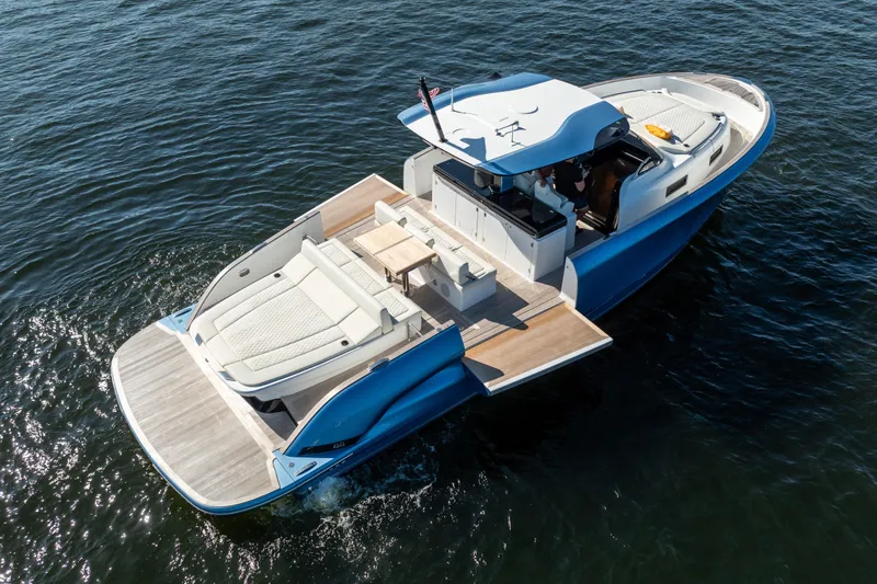 Slide: The Image of 2025 Solaris Power 44 Open yacht on water, featuring sleek design and spacious deck. - 0