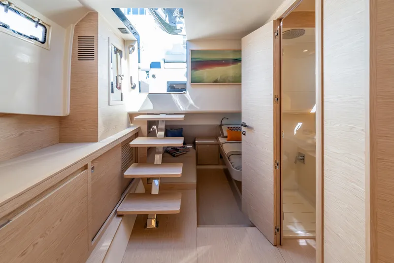 Slide: The Image of Luxurious interior of 2025 Solaris Power 44 Open yacht with modern design and wooden finishes. - 17