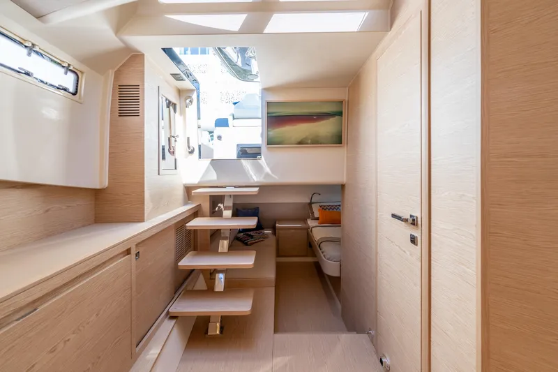 Slide: The Image of Luxurious interior of 2025 Solaris Power 44 Open yacht with modern wooden design. - 18