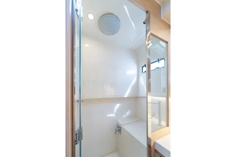 Slide: The Image of Modern shower area in 2025 Solaris Power 44 Open yacht, featuring sleek design and natural lighting. - 21