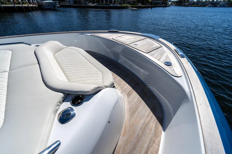 Slide: The Image of Luxurious deck of 2025 Solaris Power 44 Open yacht with elegant seating and wood finish. - 23