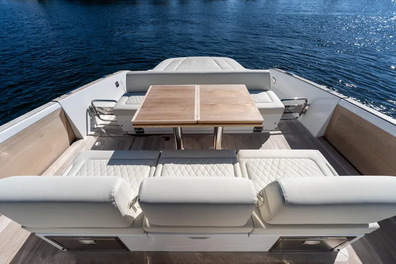 Slide: The Image of Luxurious seating area on the 2025 Solaris Power 44 Open yacht, overlooking serene waters. - 32