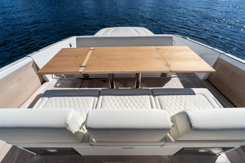 Slide: The Image of Luxurious seating and table on 2025 Solaris Power 44 Open yacht deck. - 36