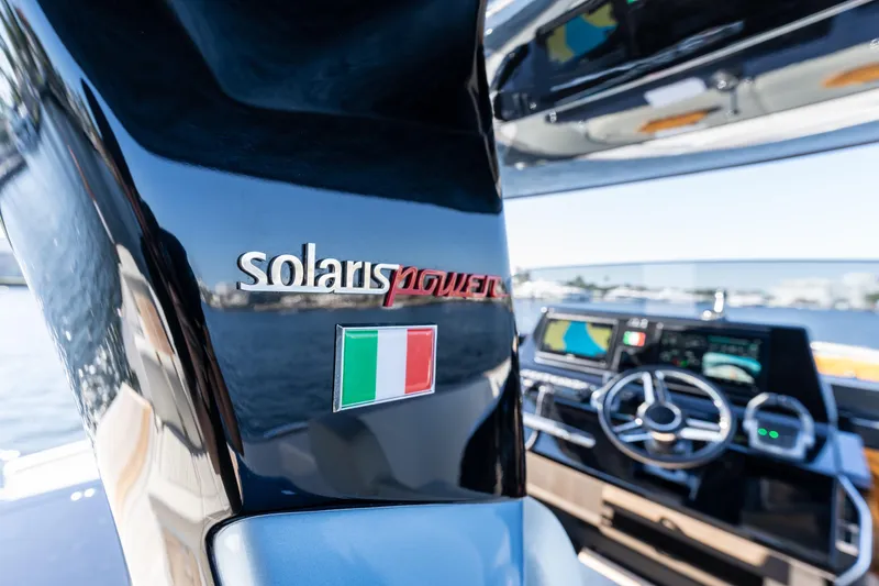 Slide: The Image of 2025 Solaris Power 44 Open yacht dashboard with Italian flag emblem. - 46