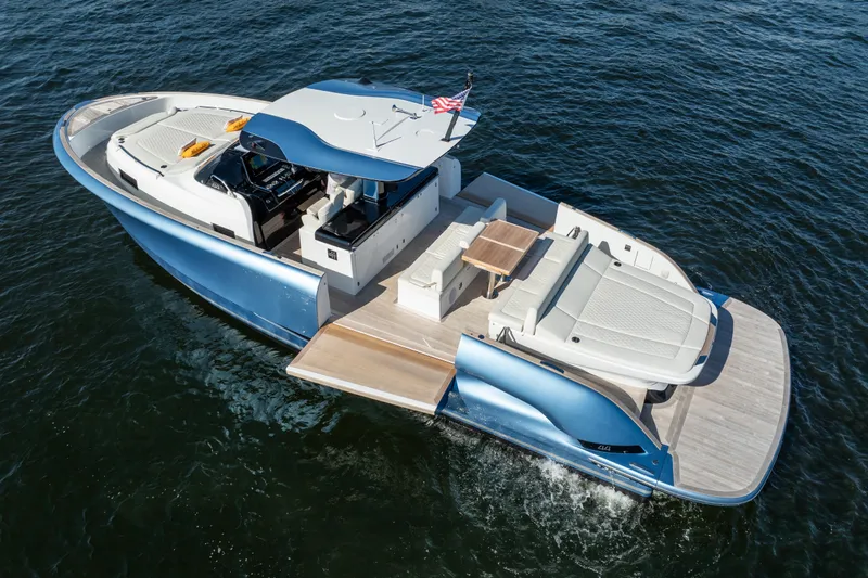 Slide: The Image of 2025 Solaris Power 44 Open yacht on water, featuring sleek design and spacious deck. - 5