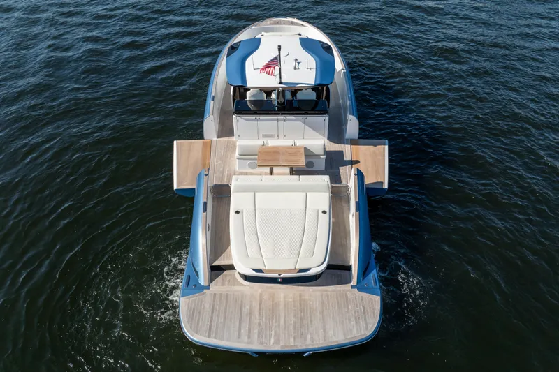 Slide: The Image of 2025 Solaris Power 44 Open yacht on water, featuring spacious deck and modern design. - 6