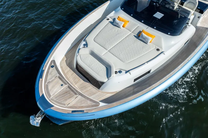 Slide: The Image of 2025 Solaris Power 44 Open yacht with elegant deck and cushioned seating. - 7