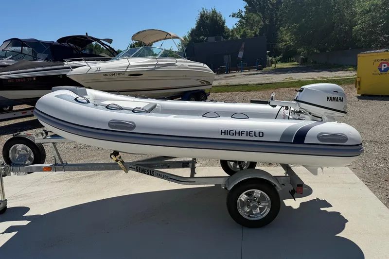 Slide: The Image of 2024 Highfield Classic 340 inflatable boat on trailer, equipped with Yamaha outboard motor. - 4