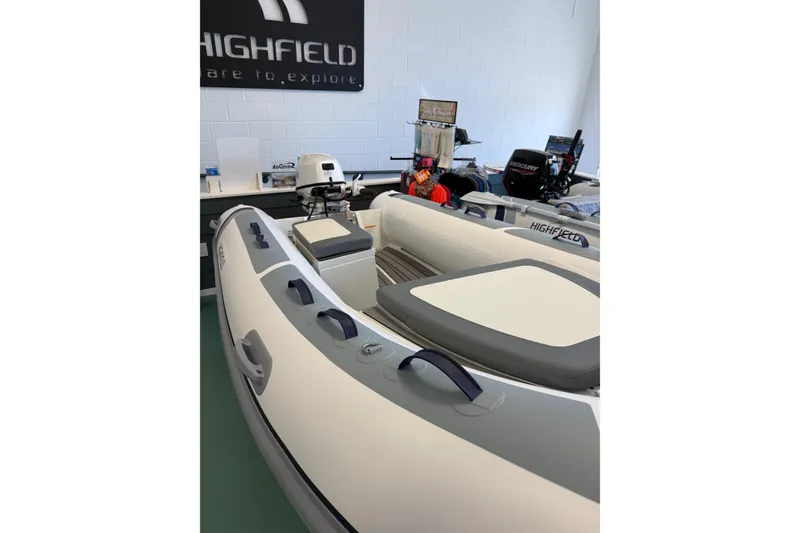 Slide: The Image of 2024 Highfield Classic 340 inflatable boat displayed in showroom. - 7