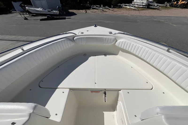 Slide: The Image of 2006 Hydra-Sports Lightning 202 DC boat interior with white seating and deck. - 15