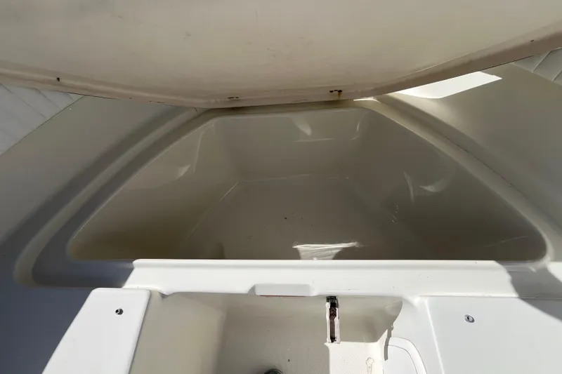 Slide: The Image of 2006 Hydra-Sports Lightning 202 DC boat storage compartment, open and empty. - 16