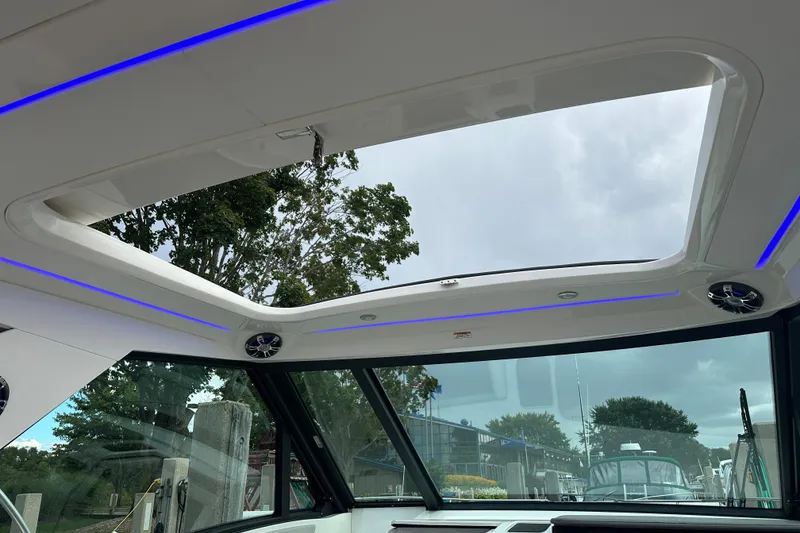 Slide: The Image of Interior view of 2021 Sea Ray Sundancer 320 Coupe Outboard with panoramic sunroof. - 20