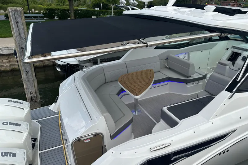 Slide: The Image of 2021 Sea Ray Sundancer 320 Coupe Outboard with sleek seating and modern design. - 25