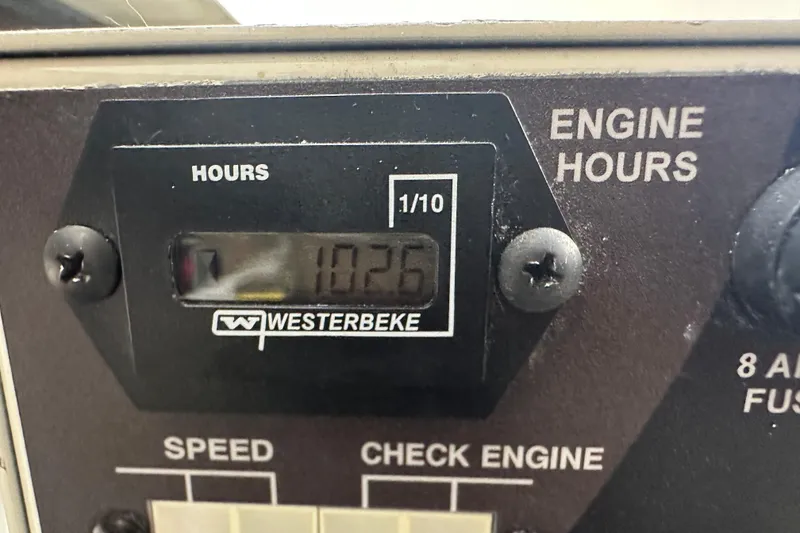 Slide: The Image of Westerbeke engine hour meter showing 102.6 hours on a 2021 Sea Ray Sundancer 320 Coupe Outboard. - 41