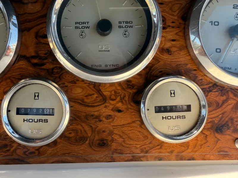 Slide: The Image of Close-up of 2002 Bayliner 3488 Motoryacht dashboard gauges displaying engine hours. - 11
