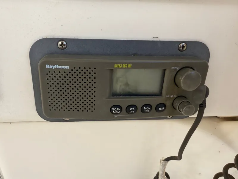 Slide: The Image of Raytheon marine radio on 2002 Bayliner 3488 Motoryacht dashboard. - 22