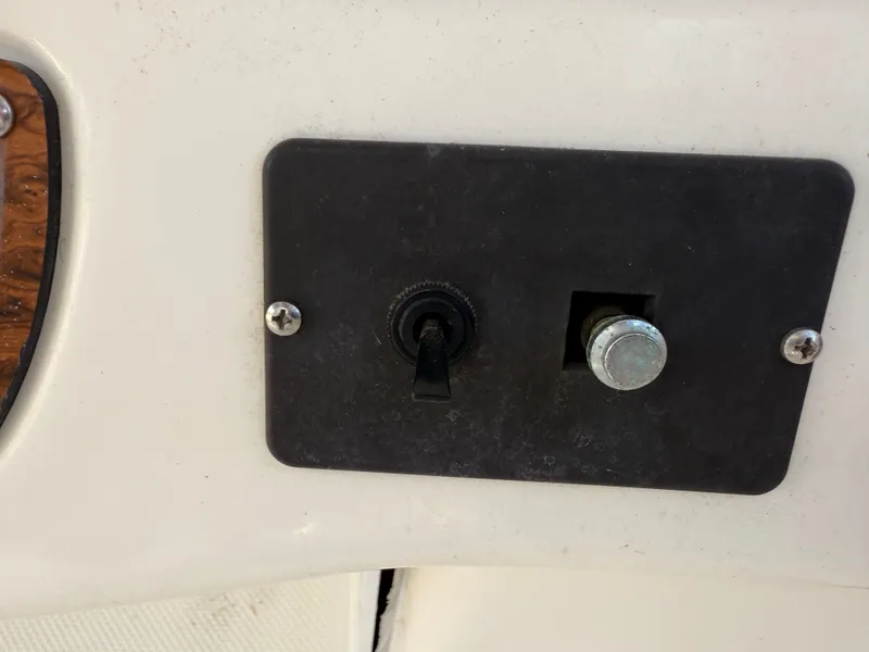 Slide: The Image of Control panel on a 2002 Bayliner 3488 Motoryacht with toggle switch and button. - 23