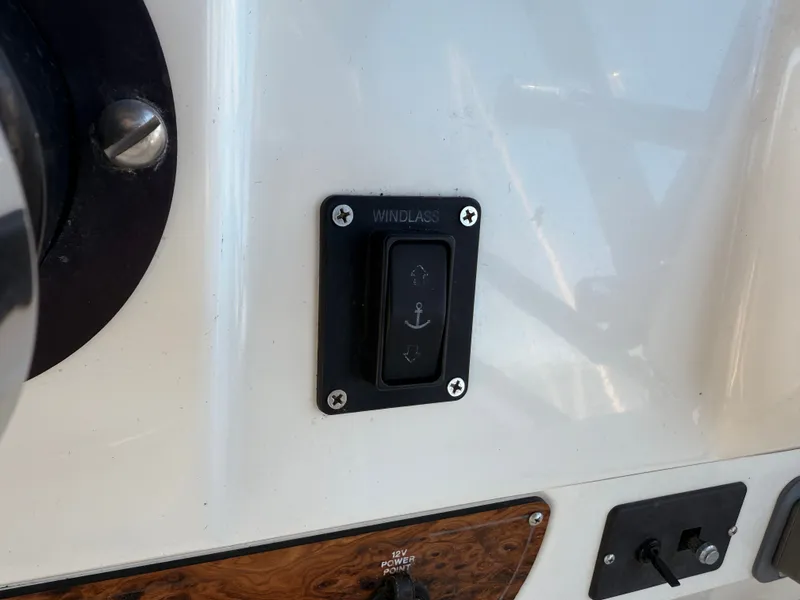 Slide: The Image of Windlass control switch on 2002 Bayliner 3488 Motoryacht dashboard. - 25