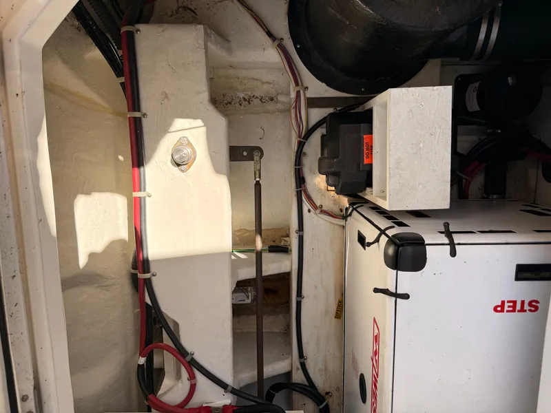 Slide: The Image of Engine compartment of a 2002 Bayliner 3488 Motoryacht, showing wiring and components. - 31