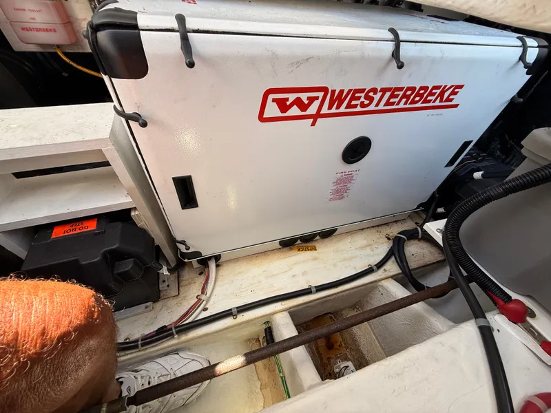 Slide: The Image of Engine compartment of 2002 Bayliner 3488 Motoryacht with Westerbeke generator. - 40
