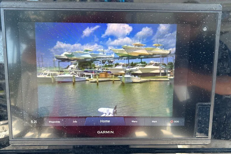 Slide: The Image of Garmin display showing marina view from 2021 Sea Hunt Gamefish 25 boat. - 26