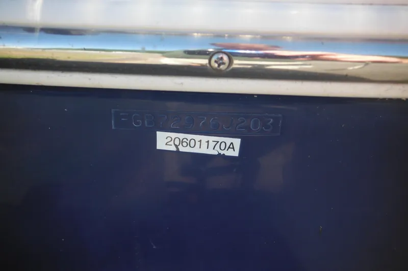 Slide: The Image of Close-up of 2003 Chaparral 180 SS boat identification numbers on hull. - 10