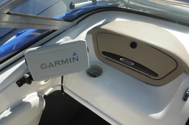 Slide: The Image of 2003 Chaparral 180 SS boat dashboard with Garmin GPS device. - 30