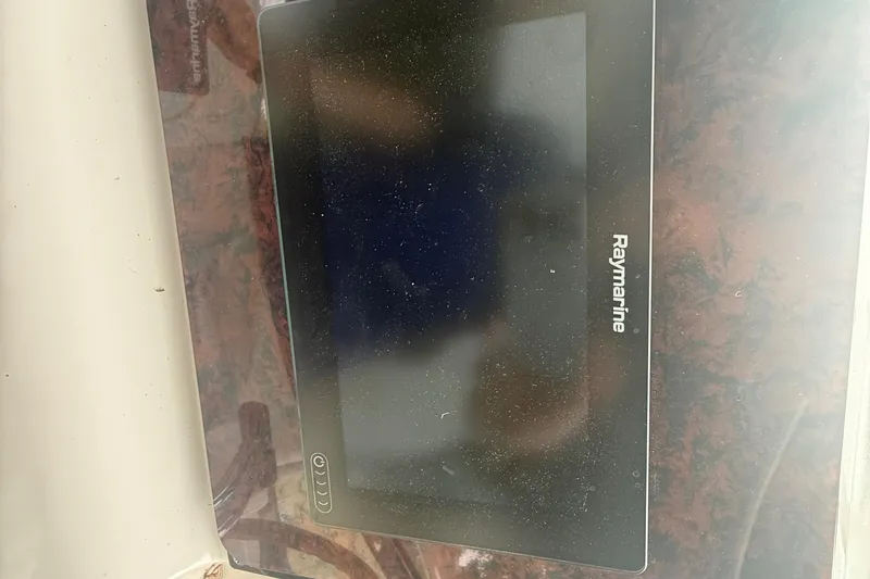 Slide: The Image of Raymarine display on 1996 Sea Ray 450 Sundancer boat dashboard. - 6