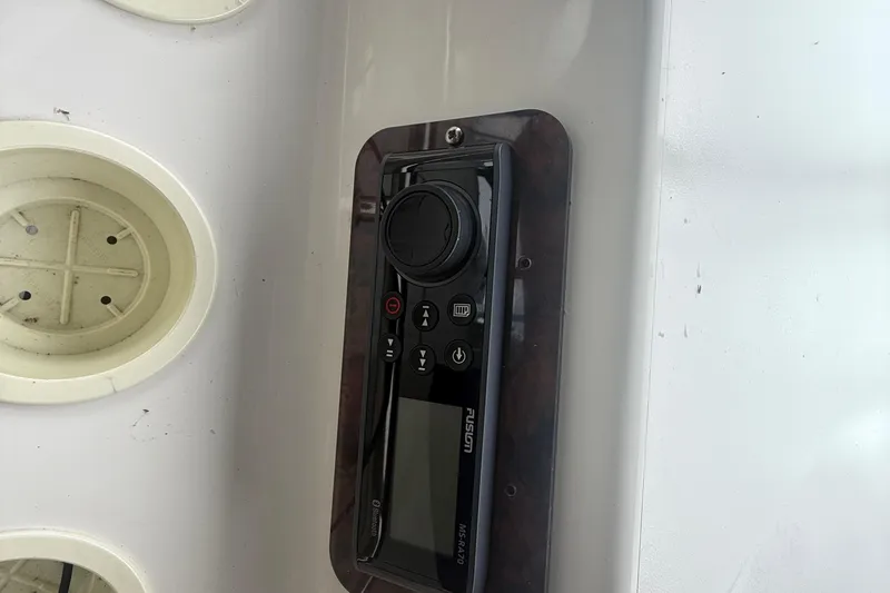 Slide: The Image of Control panel on a 1996 Sea Ray 450 Sundancer boat dashboard. - 7