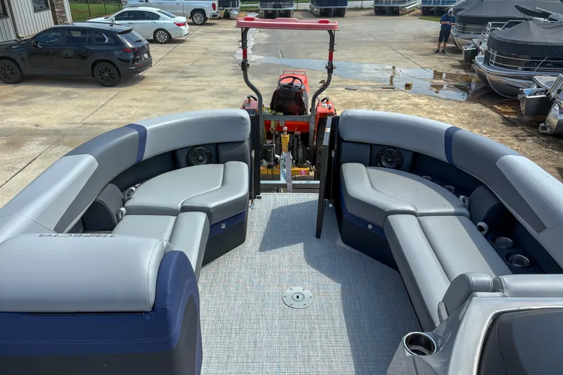 Slide: The Image of 2025 Trifecta 24 UL CS pontoon boat with spacious seating and modern design. - 12