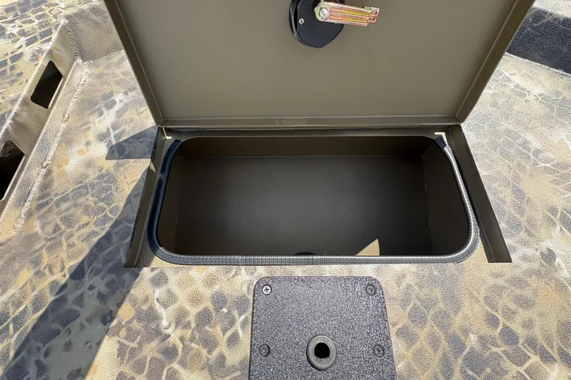 Slide: The Image of Open storage compartment on 2026 Excel Eclipse boat with camouflage pattern. - 11