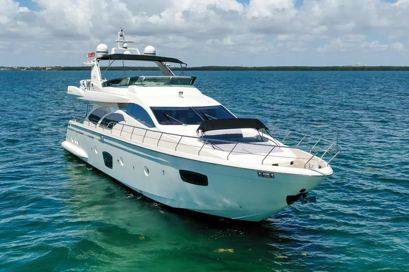 Slide: The Image of Luxury 2009 Azimut 75 yacht cruising on clear blue waters. - 3