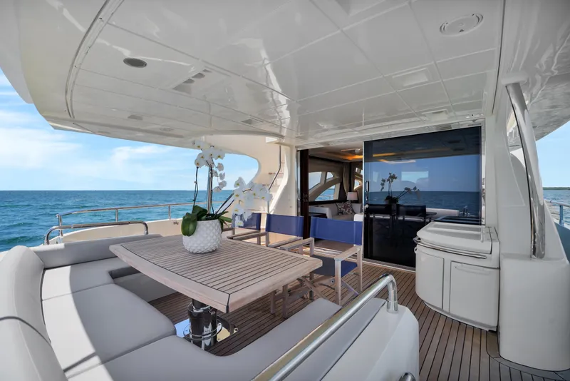 Slide: The Image of Luxurious 2009 Azimut 75 yacht deck with elegant seating and ocean view. - 40