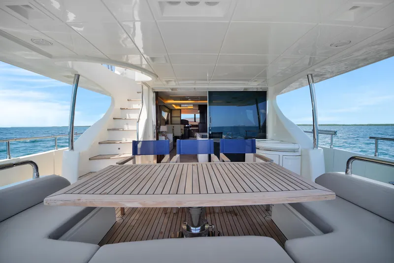 Slide: The Image of Luxurious 2009 Azimut 75 yacht deck with elegant seating and ocean view. - 43